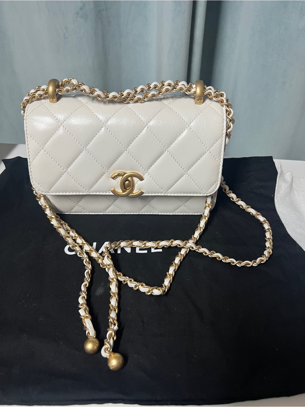 CHANEL Quilted Lambskin Adjustable Chain Bag in Cream with Gold Hardware